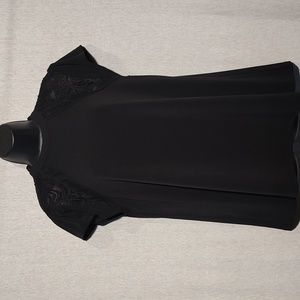 Women's black short sleeve blouse by TORRID. Size 00.